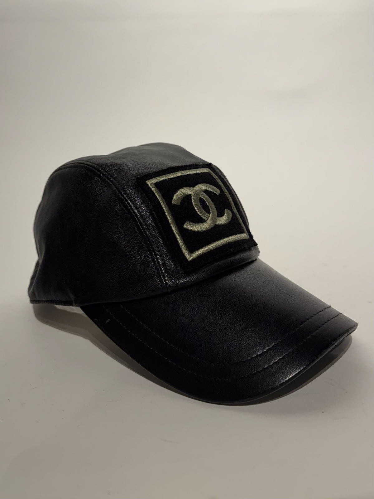 Chanel Black with Gold Yellow Logo Lambskin Hat